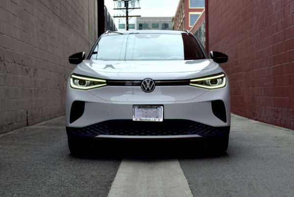 VW ID.4 front vertical in brown brick alley Los Angeles