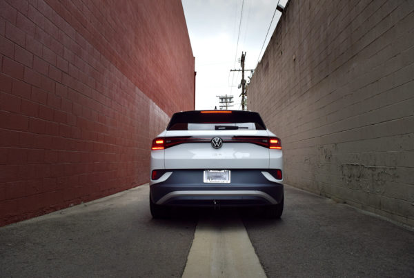 VW ID.4 rear trunk hatch in brown brick alley Los Angeles
